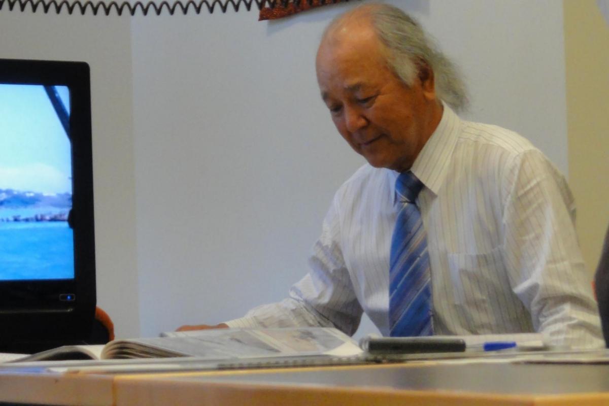 Ryugo Fujita’s son Senichiro Fujita donating a collection of photographs and manuscripts from the Fujita salvage operation at Northern Territory Library.