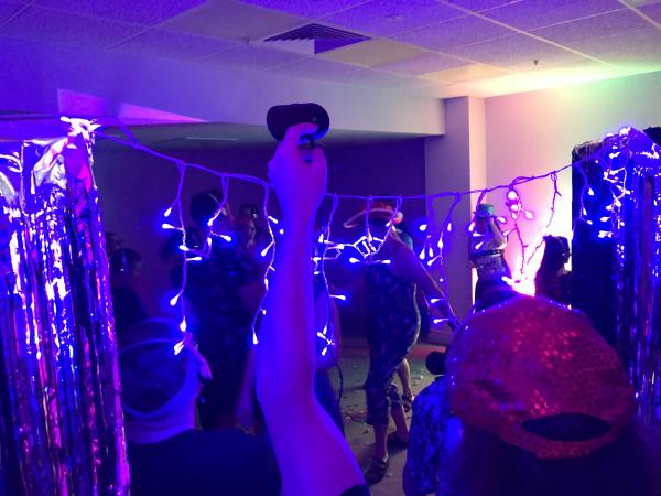 Group of people dancing in nightclub