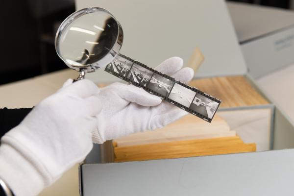 Viewing picture strip with magnifying glass