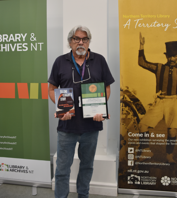 Author and historian Don Christophersen accepting the highly commended award on behalf of Dean Ashenden.