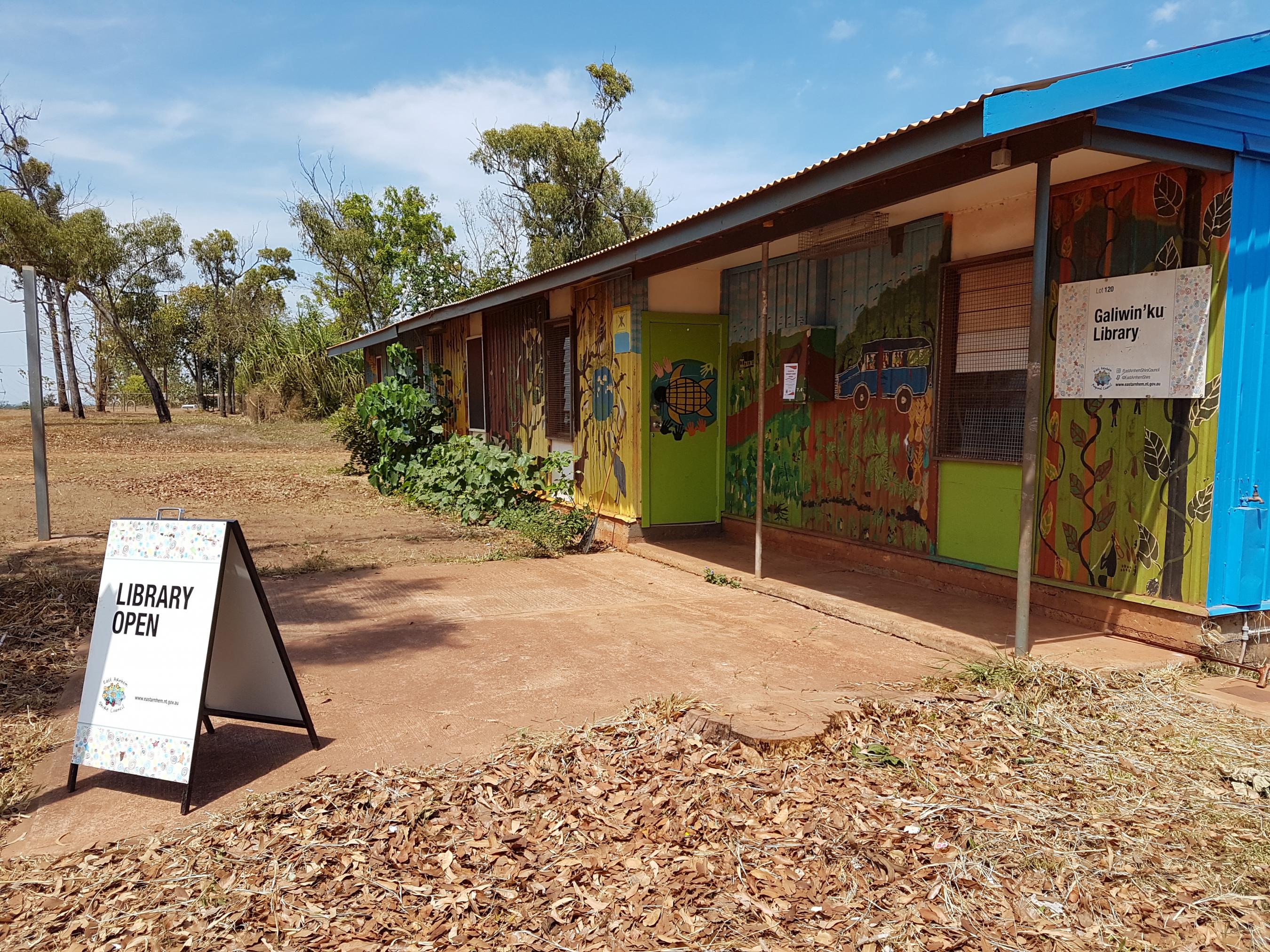 Colourful building facade and the entrance to the Galinwin'ku Community Library