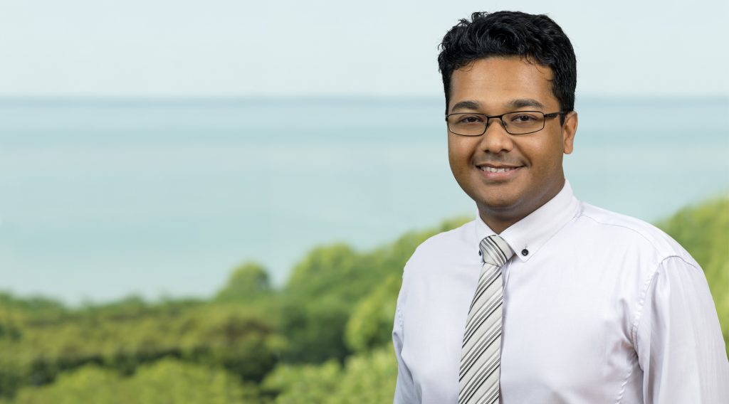 Kevin Kardirgamar portrait image standing outside