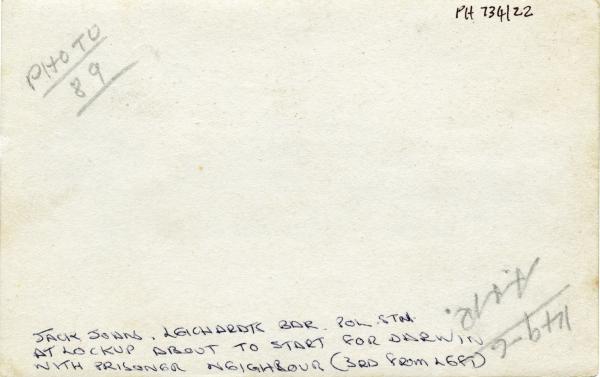 Reverse of previous photograph. Bottom lists the names of the people in the photograph.