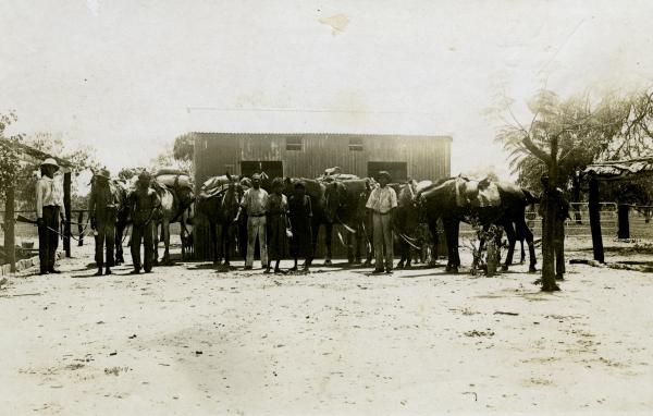 Leichardts’s Bar Lockup, c 1910: Northern Territory Library John Robert Johns Collection PH0734/0022 Lock-up at Police Station, Leichhardt's Bar, NT. Mounted Constable John Robert Johns is on the left. The third person from the left is Neighbour. He is a prisoner in chains which are held by the man second from the left.