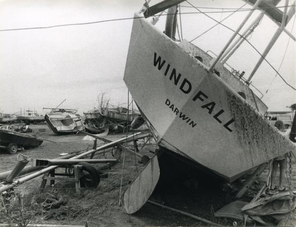 Large sailing boats washed up on beach