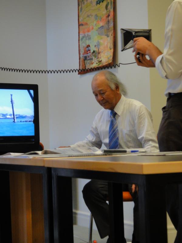 Ryugo Fujita’s son Senichiro Fujita donating a collection of photographs and manuscripts from the Fujita salvage operation at Northern Territory Library.