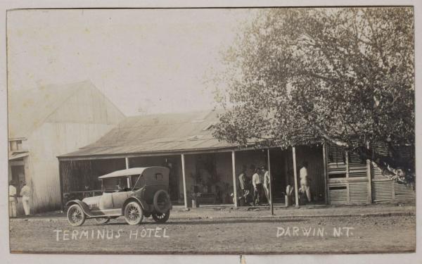 Terminus Hotel in Cavanagh Street. Old car parked out front. Tree of Knowledge to the right.