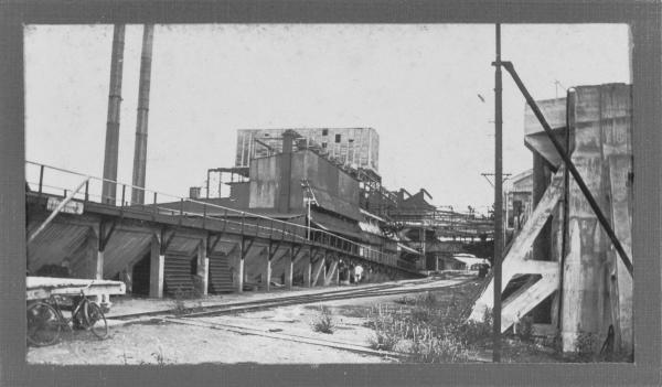 Large disused processing works and rail line.