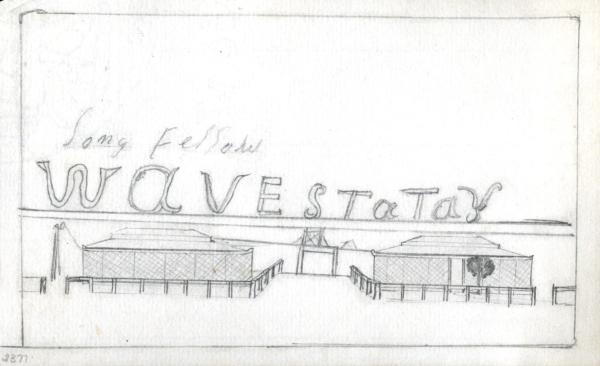 Two low buildings surrounded by a fence stand either side of a small tower.